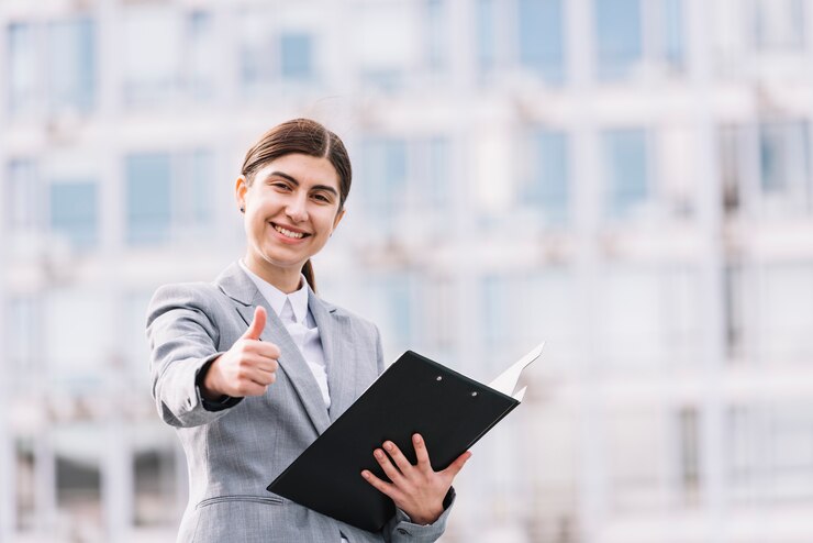 modern-businesswoman-with-clipboard-outdoors_23-2148002240